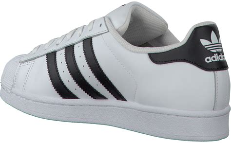 witte adidas met zwarte strepen|Adidas superstar schoenen.